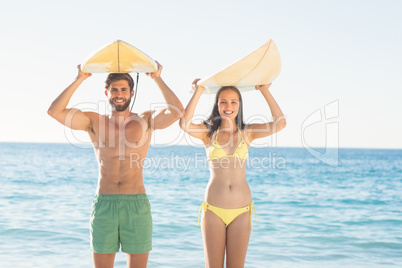 happy couple surfing