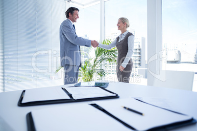 Business partners shaking hand together Business partners shaking hand together
