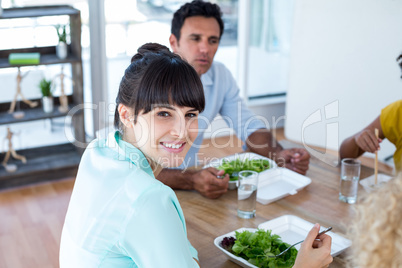 Businesswoman having lunch