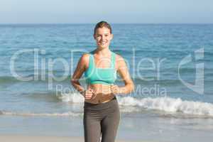 Beautiful fit woman doing jogging