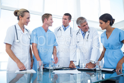 Team of doctors looking at their diaries