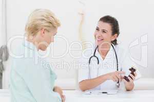 Doctor explaining treatment to her patient