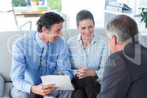 Couple in meeting with a financial adviser