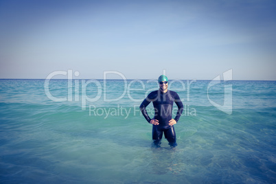 Smiling swimmer in the ocean