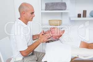 Man receiving head massage