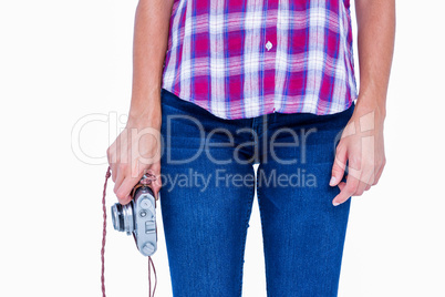 A woman holding photo camera