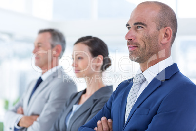 Business colleagues looking at camera