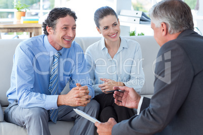 Couple in meeting with a financial adviser