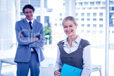 Business people smiling at the camera