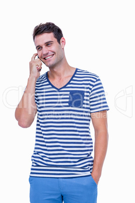 Handsome hipster having a phone call