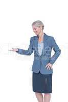 Smiling businesswoman presenting with hand