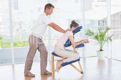 Woman having back massage