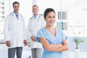 Nurse and doctors smiling at camera