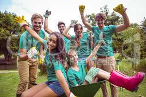 Happy friends gardening for the community