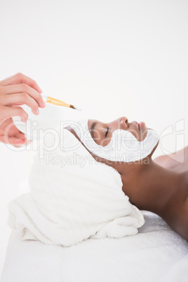 Pretty woman getting a facial treatment