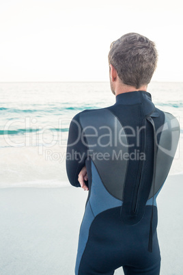 Man in wetsuit on a sunny day