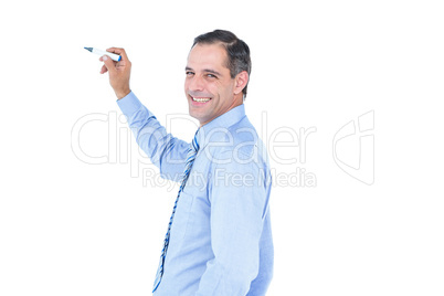 Businessman writing with black marker