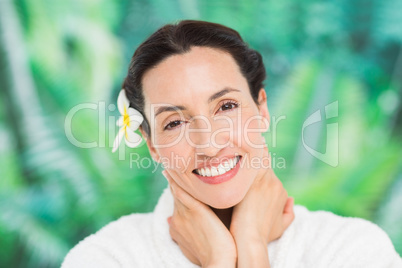 a woman with a flower in her hair