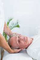 Man receiving neck massage