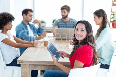 young businesswoman using a tablet