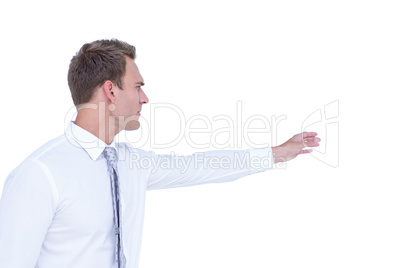 Side view of businessman showing something with his hand