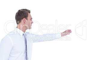 Side view of businessman showing something with his hand