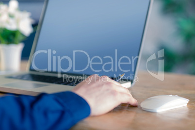 Close up of businessman working at desk