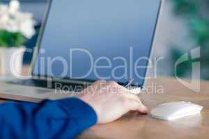 Close up of businessman working at desk