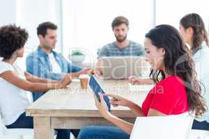 young businesswoman using a tablet