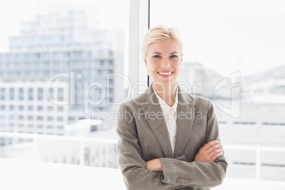 Smiling businesswoman looking at camera