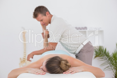 Physiotherapist doing leg massage