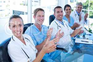 Team of doctors applauding