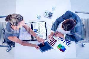 Businesswomen working together at desk