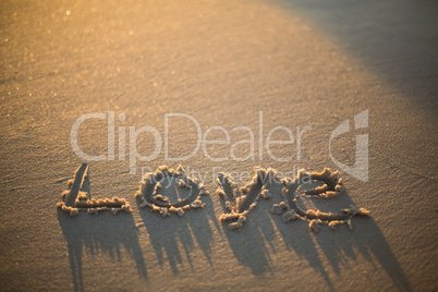 love written on the beach