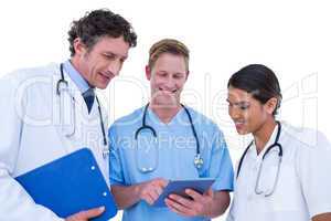 Doctors and nurses using laptop