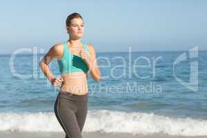 Beautiful fit woman doing jogging