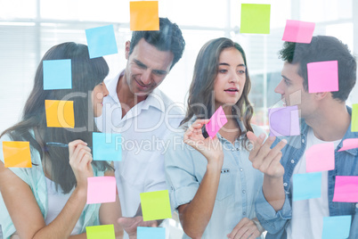 Young creative business people writing photo editor Young creative business people writing photo editor