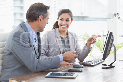 Businesswoman working with team mate