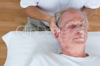 Man receiving neck massage