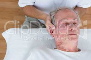 Man receiving neck massage