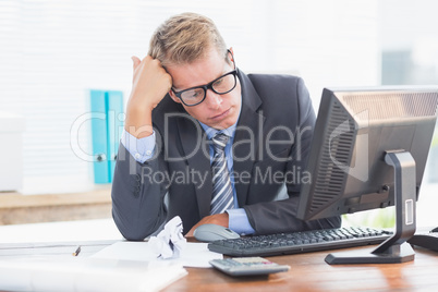 Businessman being depressed by accounting