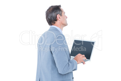 excited cheering businessman sitting using his laptop