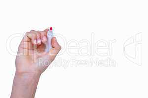 Hand of woman holding red markers