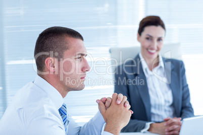 Business people in discussion in an office