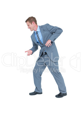 Businessman pulling with hands