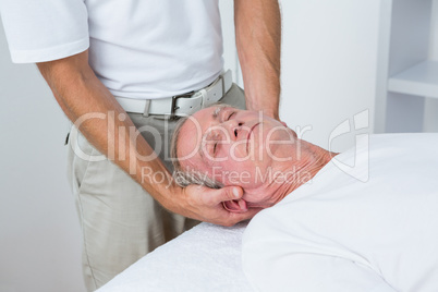 Man receiving neck massage