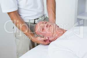 Man receiving neck massage