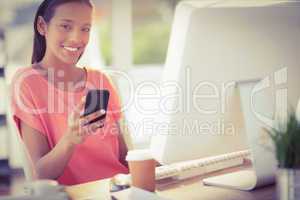 Pretty businesswoman smiling at the camera