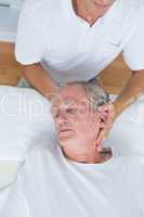 Man receiving neck massage