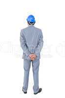 Businessman with helmet turning his back to camera